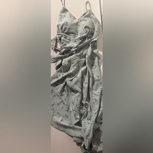 Dress that backless, goes to the ankles from the back & just above the knees